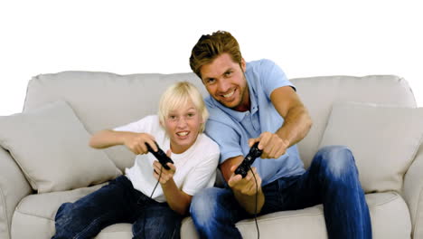 Father-and-son-playing-video-games-on-white-background-