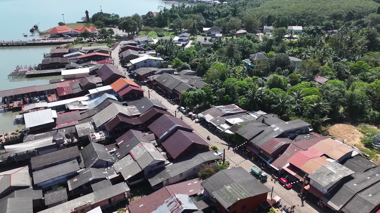 Beautiful aerial of wooden buildings on water in old town, Chinese fishing village, Koh Lanta, Thailand