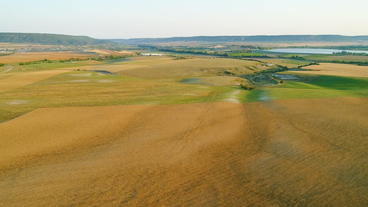 Aerial View of Agricultural Fields and Hills
