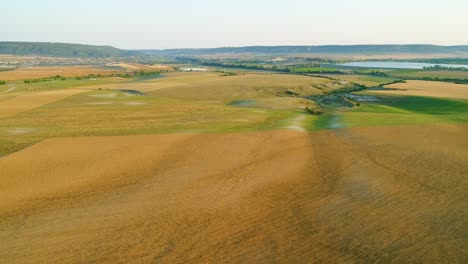 aerial view of agricultural fields and hills
