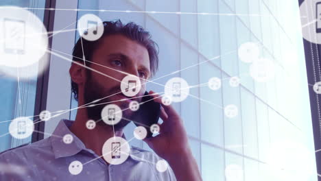 animation of network of connections over caucasian businessman using smartphone