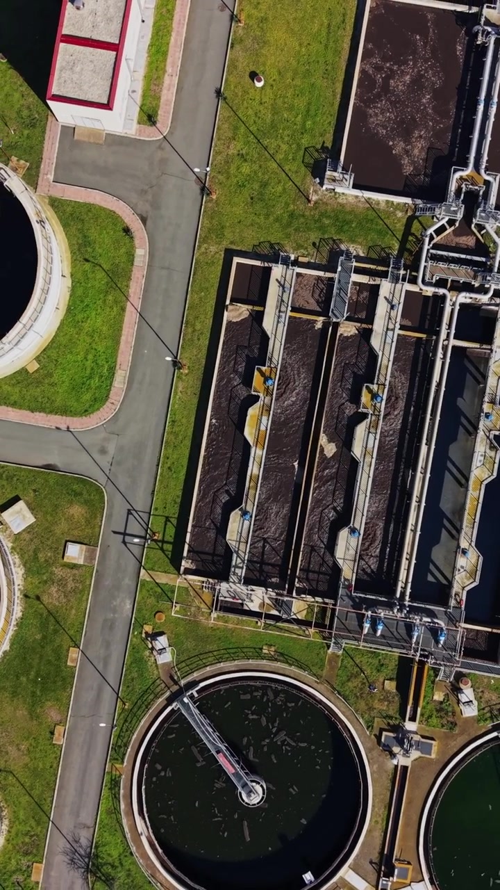 Aerial view shows a water treatment facility in a city