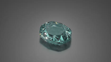 bluish-green teal gemstone rotates closeup 3d render seamless loop animation