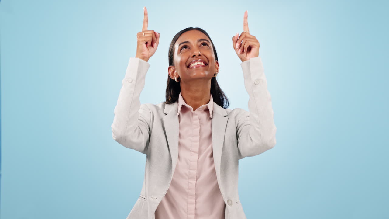 Happy business woman, pointing up