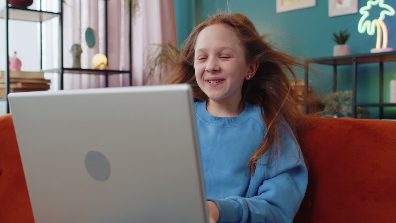Shocked amazed girl with windswept hair opening using laptop smiling receive mail good news message