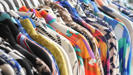 colorful shirts on a display rack