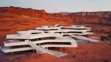 modern white architectural complex in a red desert landscape