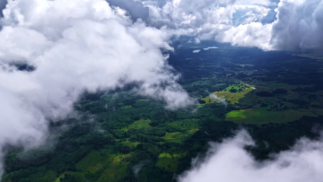 Nature forest countryside rural landscape aerial drone above clouds high altitude