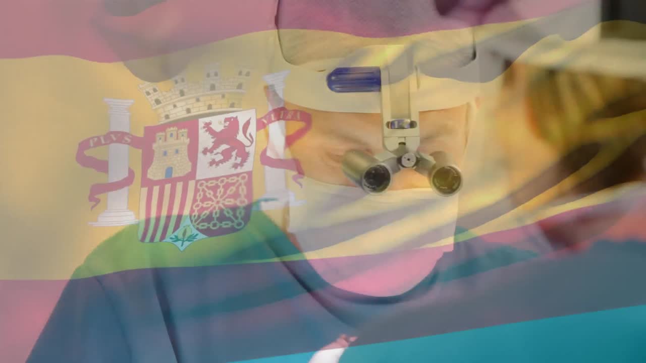 animación de la bandera de españa ondeando sobre los cirujanos en el quirófano
