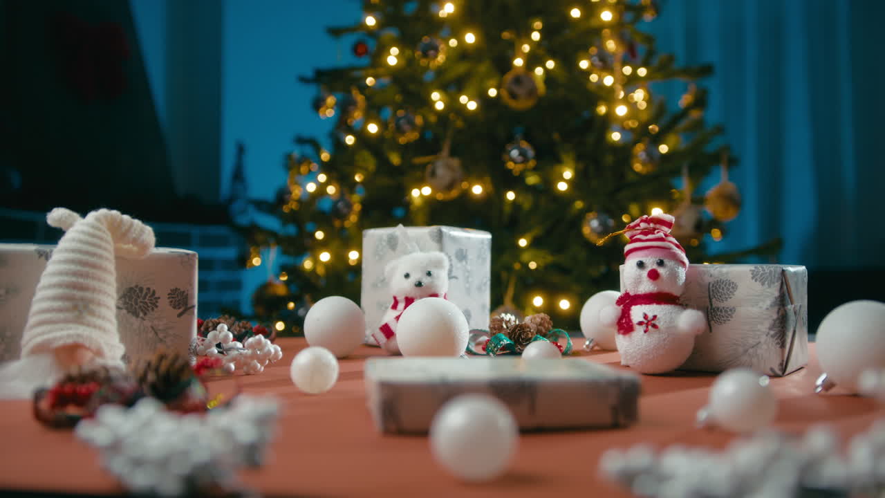 Christmas table with ornaments, puppets and gifts for children