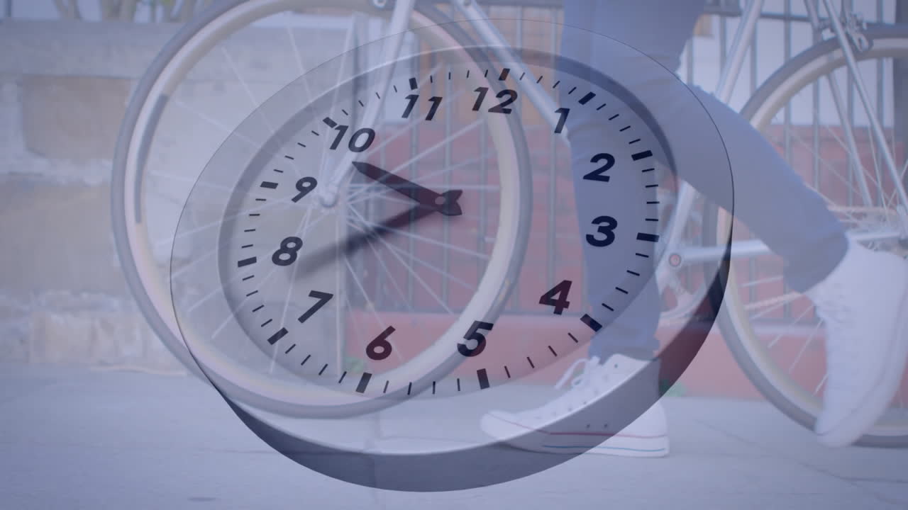 Clock face animation over person walking with bicycle and wearing sneakers