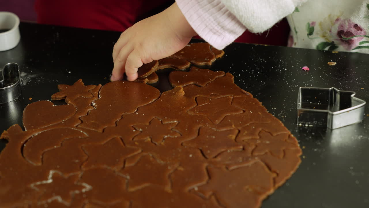 Kid Hands Make Star Shaped Cookies DIY Making Gingerbread - Close Up