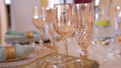 elegant wine glasses on wedding table settings at the reception