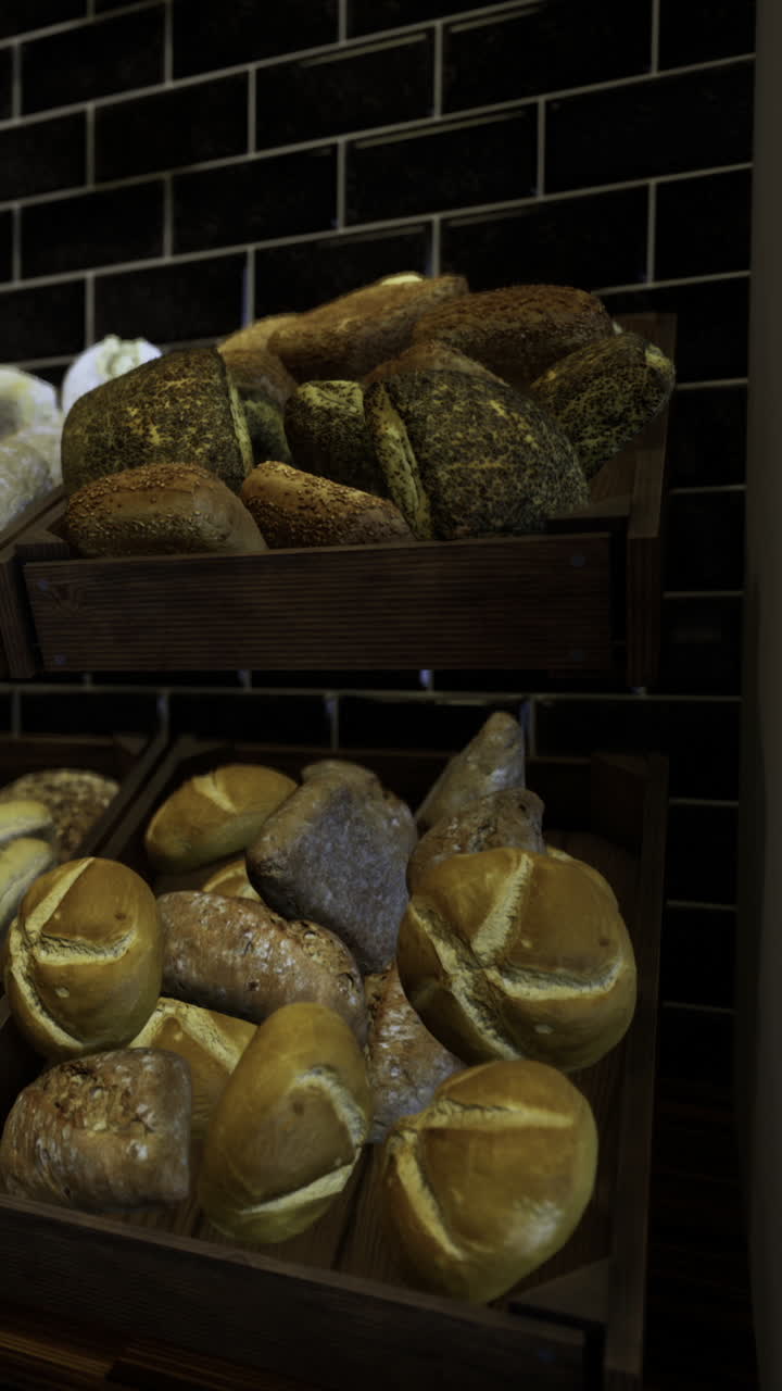 Freshly baked bread displayed in a bakery during morning hours