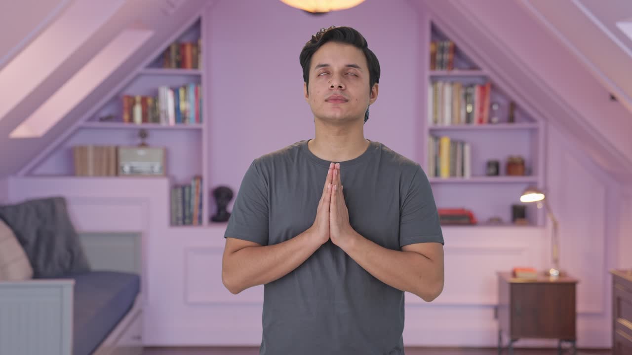 Religious Indian man praying to God
