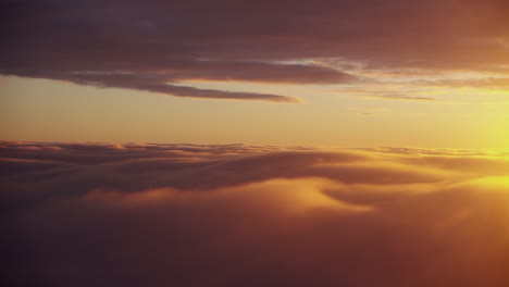 beautiful sunrise above the clouds