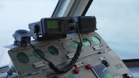 boat's control panel with radio and gauges