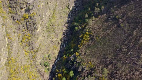 Panoramic-aerial-view-along-the-riverbeds-of-Cascata-De-Fisgas-Do-Ermelo---Beautiful-cascading-waterfalls-in-the-Parque-Natural-do-Alvao---Portugal