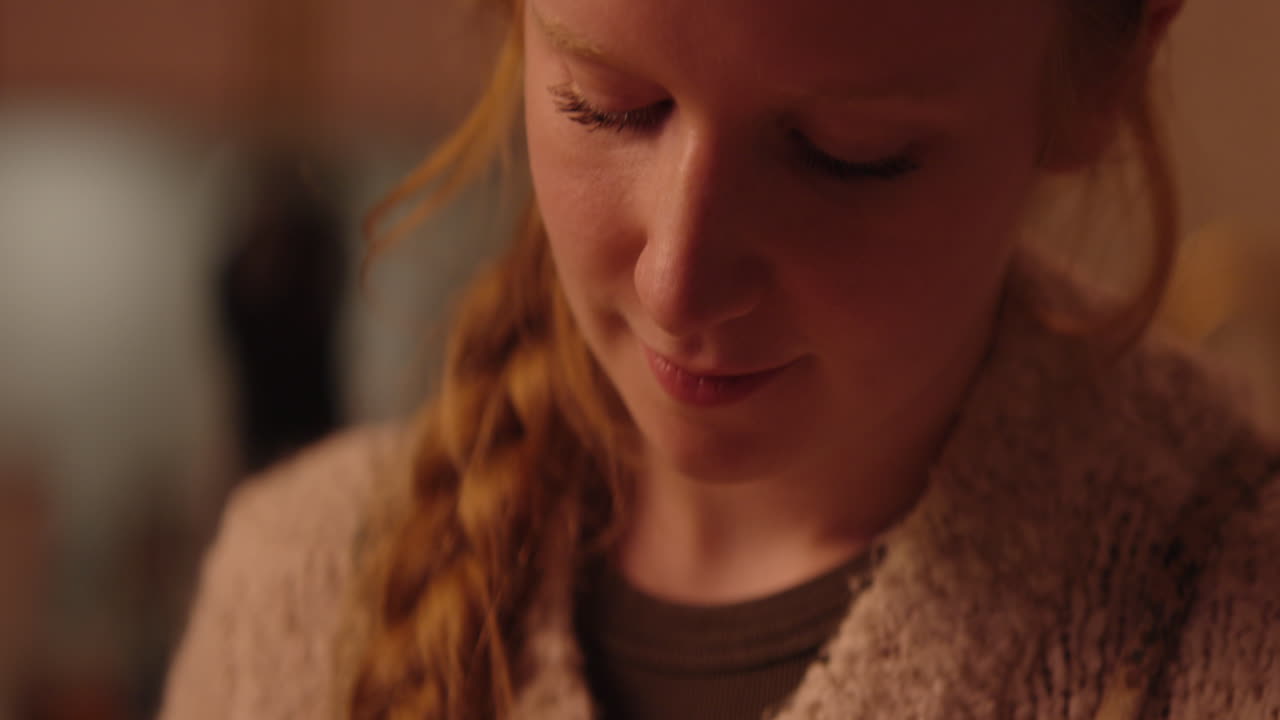 Close-up of a woman with a braid