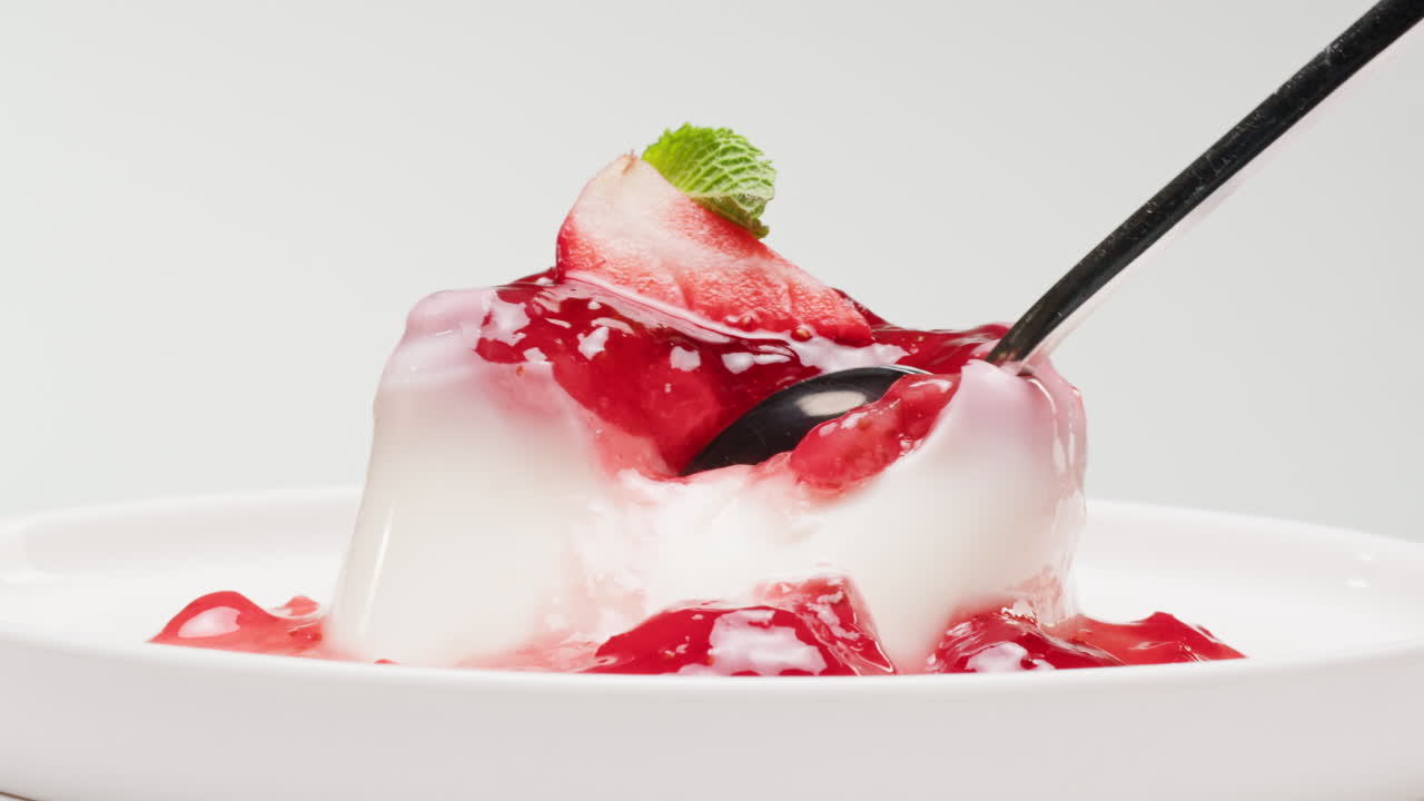 Spoonful of Strawberry Panna Cotta Dessert