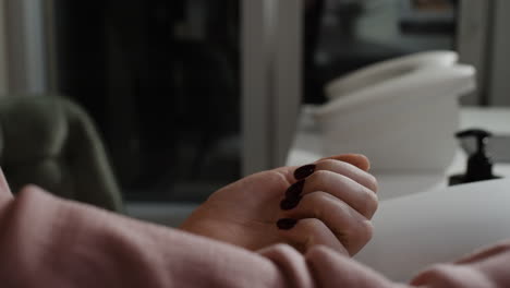 woman getting her nails done