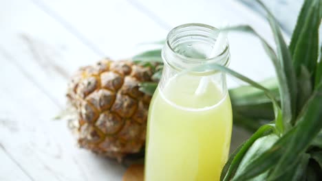 pineapple juice in a glass bottle