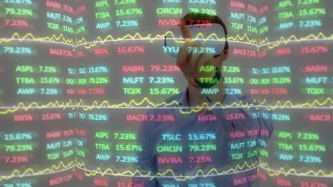 animation of financial data processing over businessman wearing vr headset