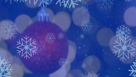 Animation-of-christmas-tree-balls-over-christmas-garlands-bokeh-on-blue-background