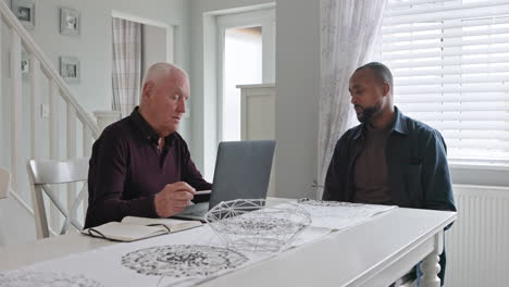 two men in a meeting in a home interior
