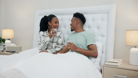 Bedroom,-happy-and-black-couple-with-coffee