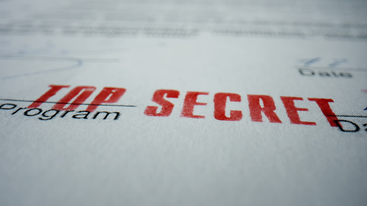 Closeup sign top secret on private document. Red prohibition stamp on text.