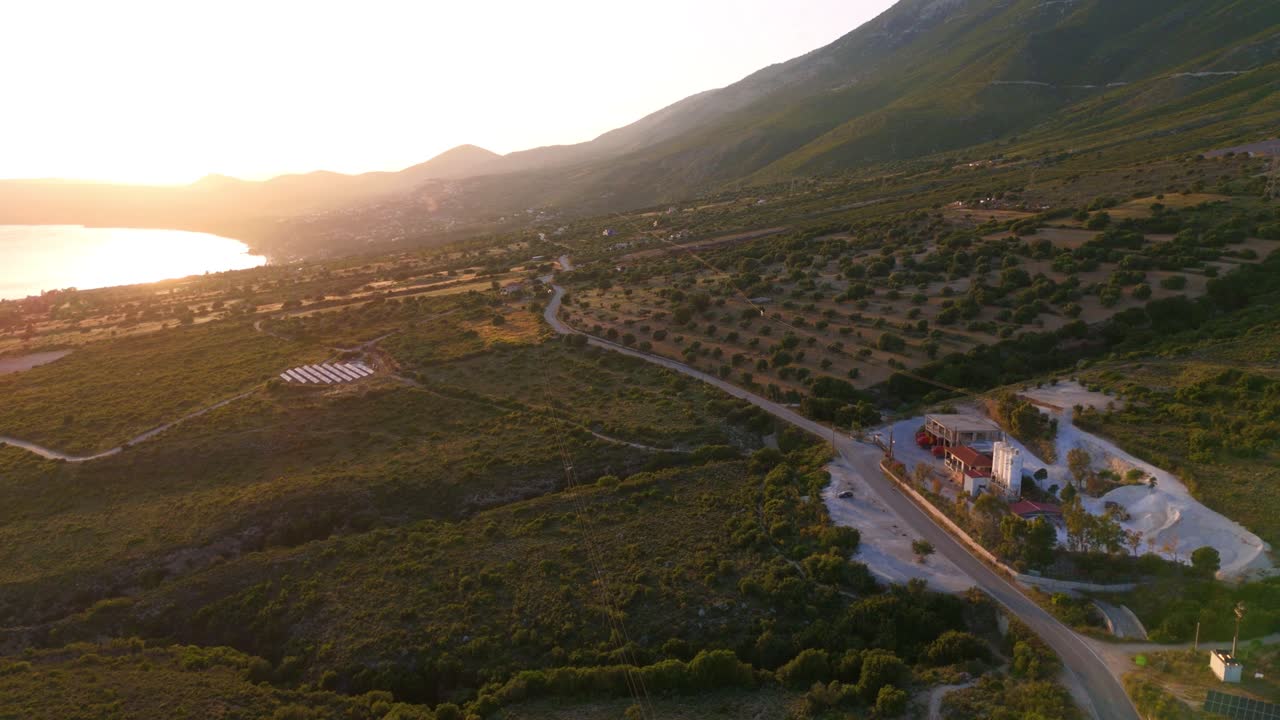 Aerial drone view of solar power photovoltaic panels dramatic sunset in Kefalonia Greece Europe