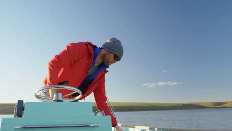 man riding motorboat in river 4k