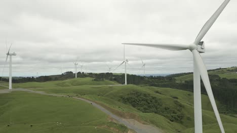 drone shot of wind turbine in a wind farm in new zealand