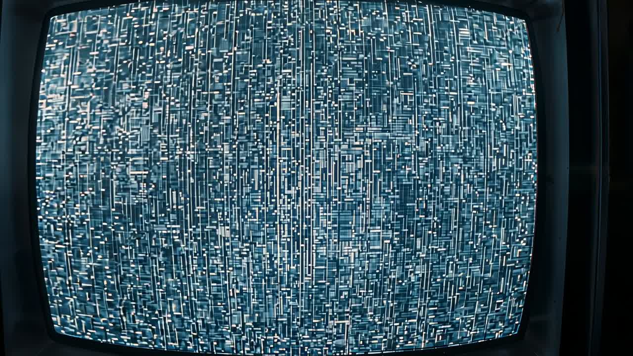 Power indicator light turning on, CRT television set displaying shifting static grid in dim room