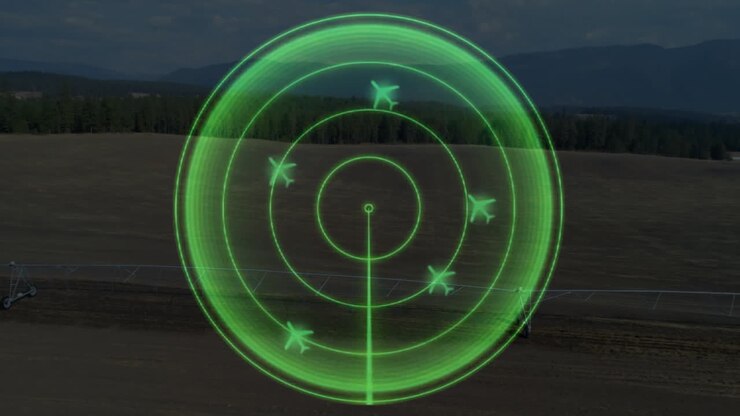 Green radar animation with multiple aircraft icons over rural landscape