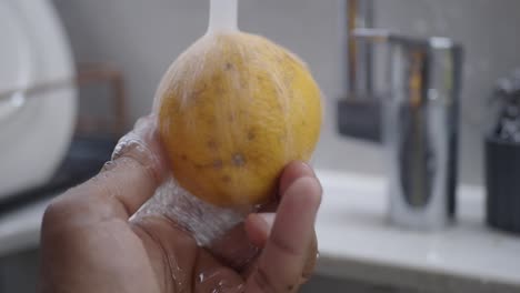 washing a lemon