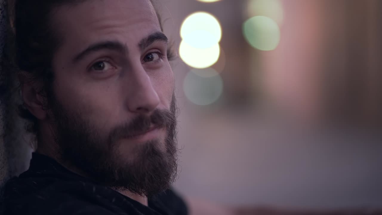 Man in the city at night