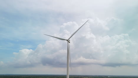 Sustainable-Energy:-Majestic-Wind-Turbine-Towering-Against-a-Cloudy-Sky