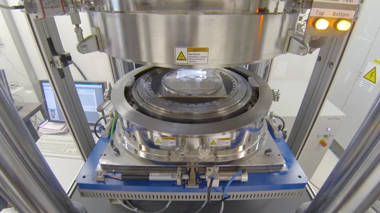 close up of a hot embossing polymer wafer machine in lab. Testing to emboss. Embossing device in al laboratory.