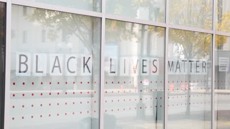 black lives matter sign in retail window