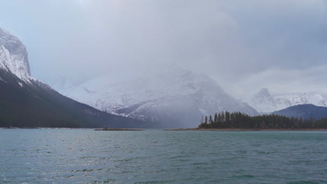 Windy-scene-of-mountains-with-a-lake-during-an-overcast-day