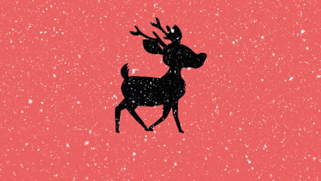 digital animation of snow falling over black silhouette of reindeer walking against orange