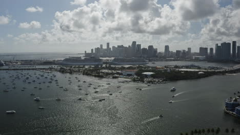 glimmering cityscape of miami, florida with views of the ocean and luxury cruise ship