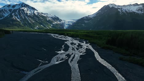 braided channels of river with mountain landscape, view from exit glacier road in alaska, usa