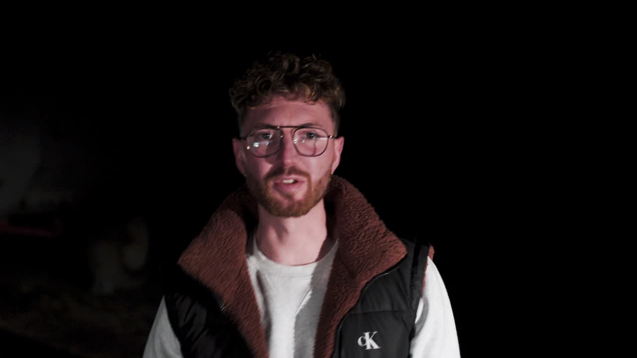 Concept video of a musician rapper singing and gets attacked by hooded robbers