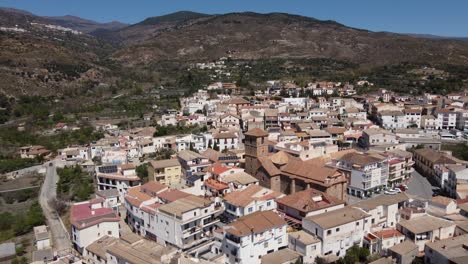 aerial approach to cádiar, in the alpujarras district of granada, spain
