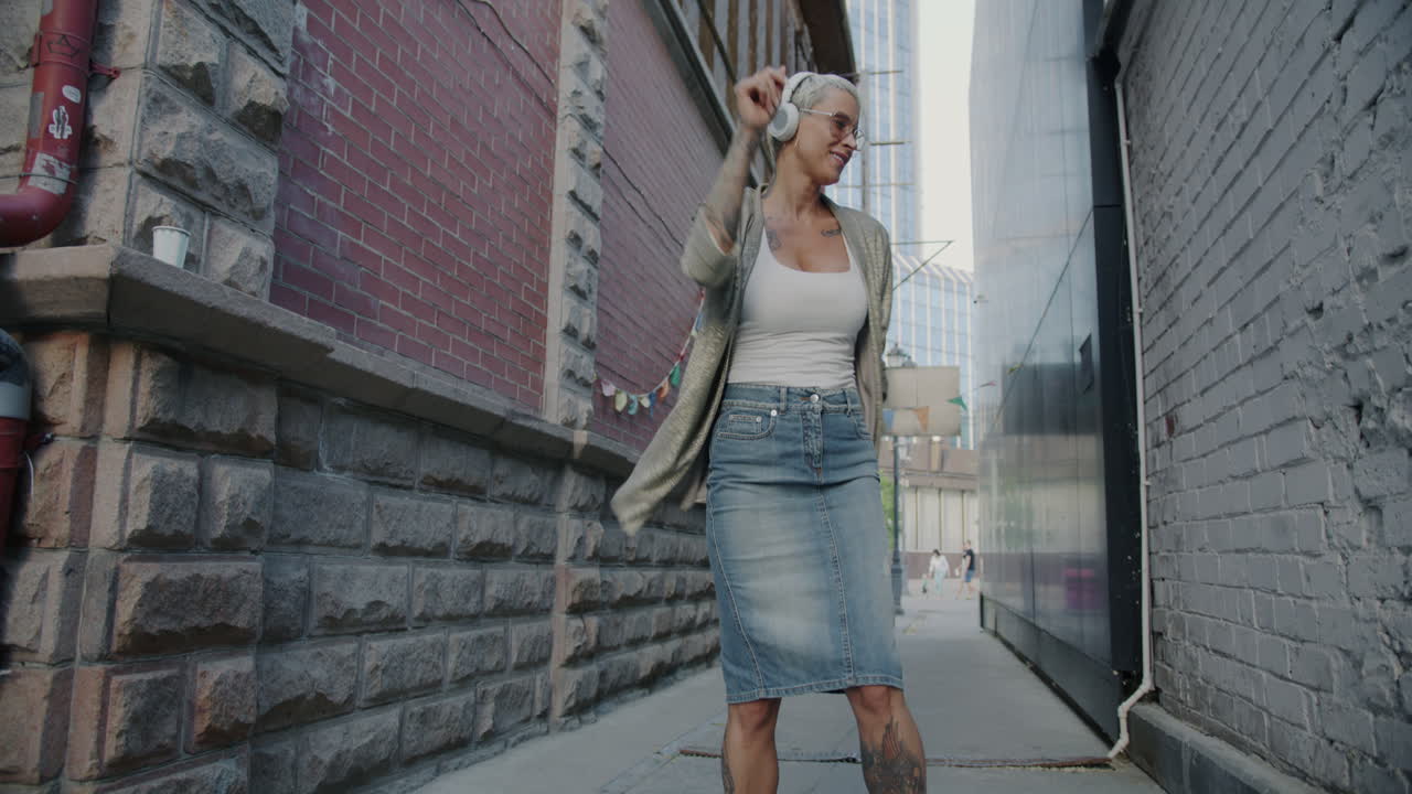Woman Dancing in Urban Alleyway