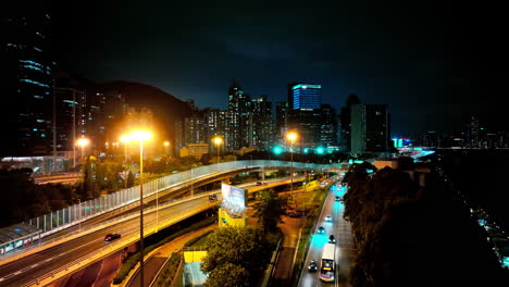 a view of a city at night from a bridge