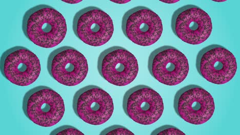 stop motion animation of pink glazed donuts appearing on blue background top view